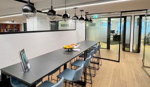 Image of a row of chairs at a bar